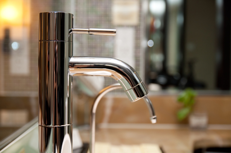 Leaking tap being repaired in Longfield